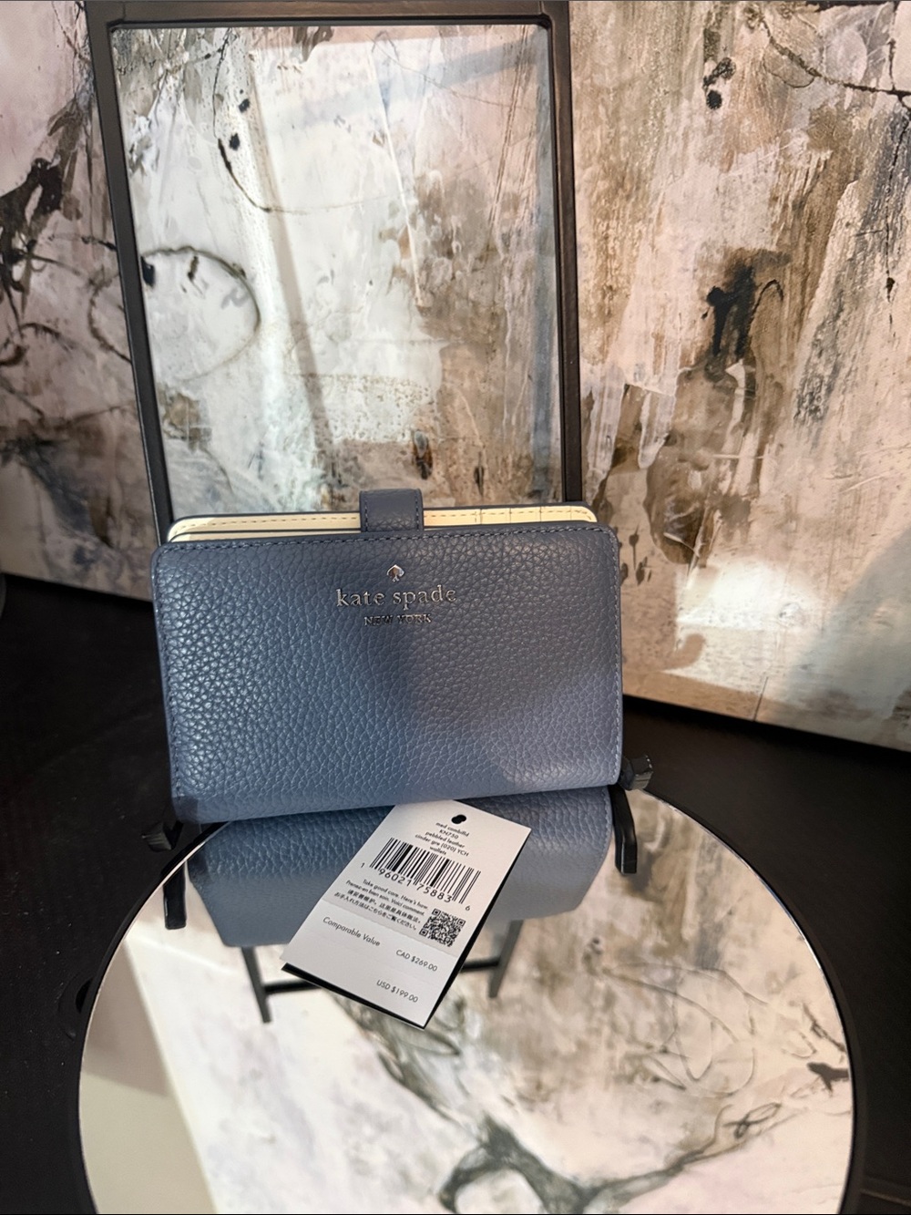 kate spade slate blue pebbled leather snap wallet with gold logo